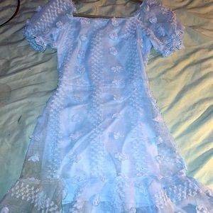 light blue maxi dress, tight fitted.